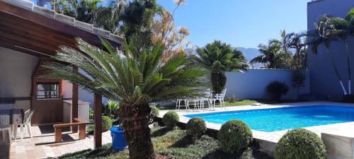 Morada da Praia House | Enchanting Sobrado with Pool in Private Community