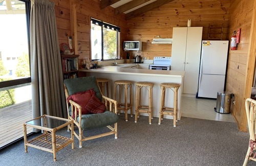Whareroa Village House | Top-Rated Linga-Longa Lakeside Retreat with Ocean View