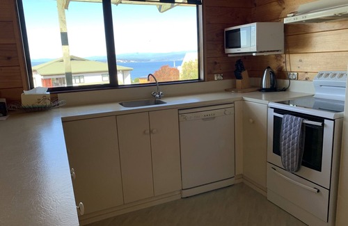 Whareroa Village House | Top-Rated Linga-Longa Lakeside Retreat with Ocean View