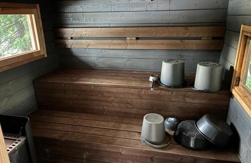 Mikkeli Ski Chalet | Charming Lingonberry Cabin with Ocean View and Private Beach