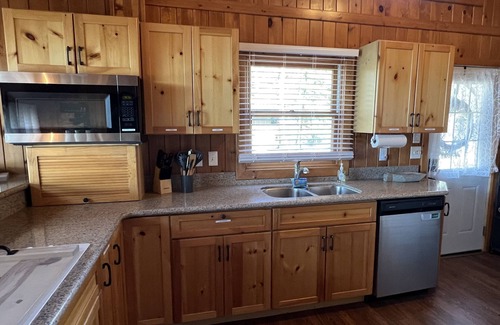 King Cottage | Experience Lion on Sunset Lake: Pet Friendly Retreat Awaits