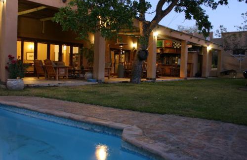 Thorny Bush Game Reserve Cabin | Discover Lion Tree Top Lodge: Oceanfront Bliss Awaits