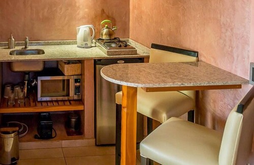 Playa Bonita Apartment | Premier Lirolay Suites: Exceptional Stay with Spa & Lake Views