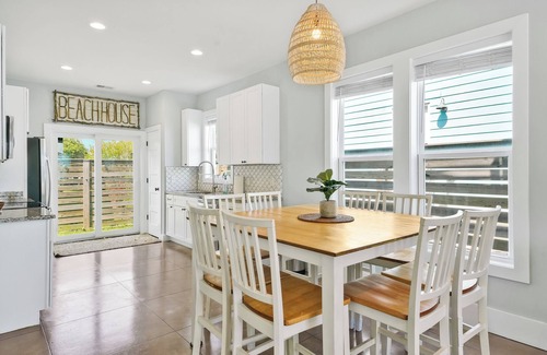 Kure Beach House | Experience Ocean Views at Boho Chic Palm Paradise