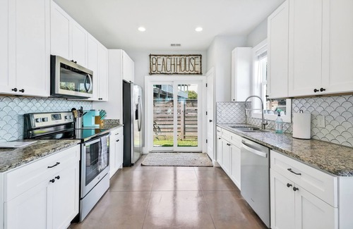 Kure Beach House | Experience Ocean Views at Boho Chic Palm Paradise