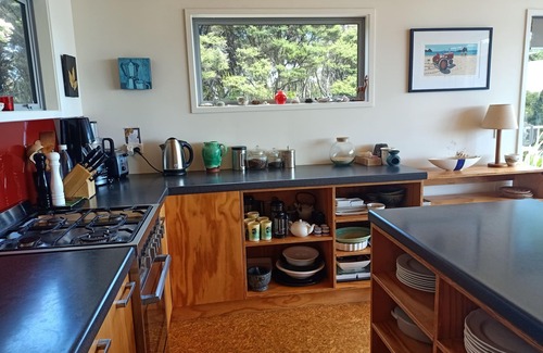 Waikawau House | Eco-Friendly Little Bay House with Oceanview & Pool Access