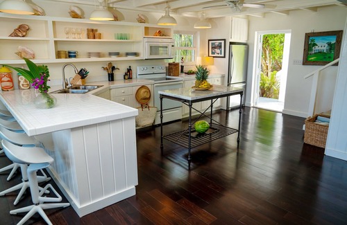 Dunmore Town House | Unforgettable Sunsets and Fishing at Little Bay Hotel