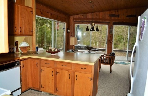 Irons House | Discover Little Manistee River Cabin: Family-Friendly Retreat