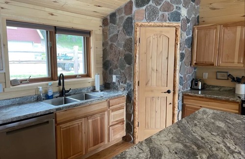 Grand Rapids Cabin | Cozy Little Red Cabin by Beautiful Lake Wabana!