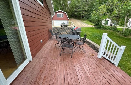 Grand Rapids Cabin | Cozy Little Red Cabin by Beautiful Lake Wabana!