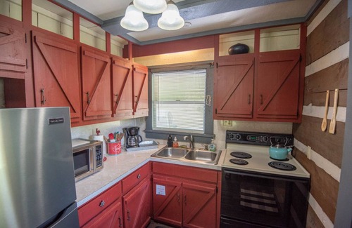 Lansing Cabin | Riverfront Retreat: Guest Rated 9.8 with Fire Pit & Porch