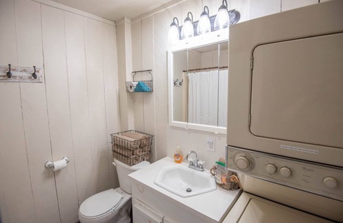 Lansing Cabin | Riverfront Retreat: Guest Rated 9.8 with Fire Pit & Porch