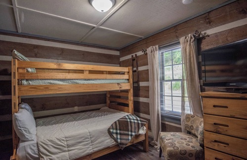 Lansing Cabin | Riverfront Retreat: Guest Rated 9.8 with Fire Pit & Porch