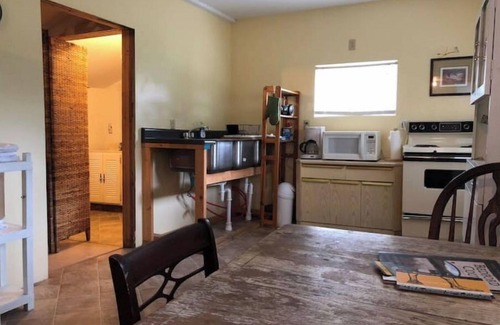 Manns Choice Cabin | Charming Little White Cabin: Riverfront Getaway & Activities