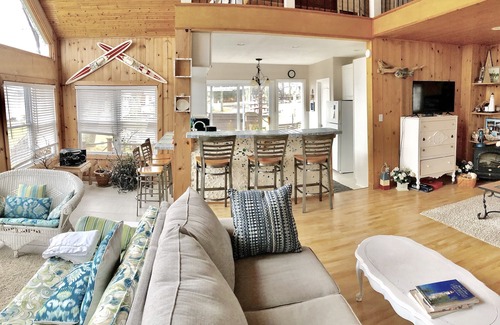 Chippewa Lake House | Charming Little White Cottage by Chippewa Lake with Views