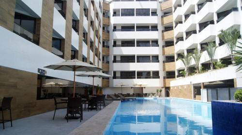 Cabo Branco Hotel | Discover Littoral Gold Flat: Relaxing Pool & Spa Retreat
