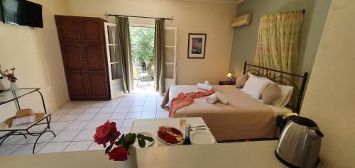 Lakka Apartment | Inviting Livadi Studios with Pool & Oceanfront Views