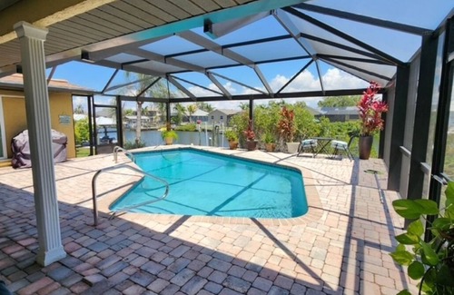 Apollo Beach House | Waterfront Retreat with Pool, Dock & Adventure Awaits