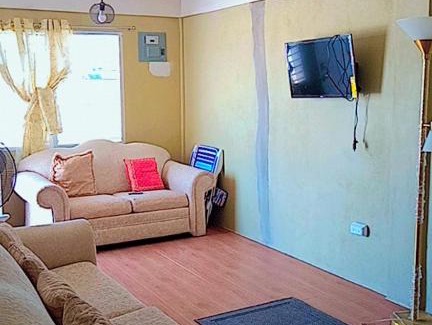 Dangriga Apartment | Experience Spacious Living with Family-Friendly Amenities