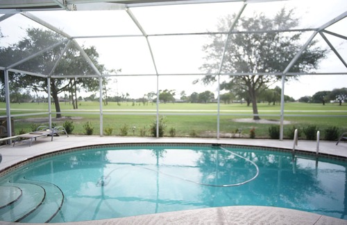 San Carlos Park House | Experience Living on the Green: Pool Home with Ocean Views