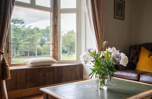 Kingswood House | Relax at Llanerchydol Hall Suites: Pet-Friendly Retreat