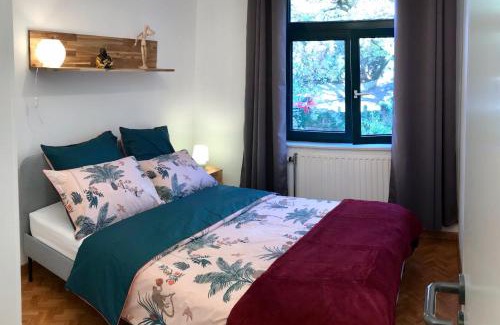 Quartier des Bruyeres Apartment | Top-Rated LLN Lodge: Family-Friendly with Dining Options
