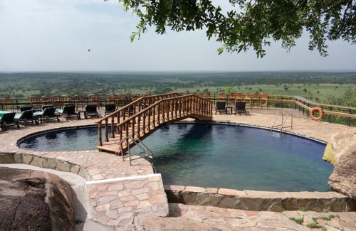 Olakira Camp Cabin | Exceptional Lobo Wildlife Lodge: Pool, Breakfast & Family Fun