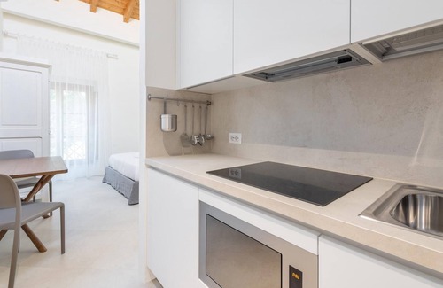 Santa Margherita di Pula Apartment | Discover Locanda Della Meridiana - Family-Friendly Retreat