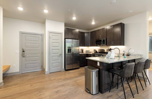 Lakeside Village Condo | Elevated Retreat: Private Balcony, Mountain Views & Spa