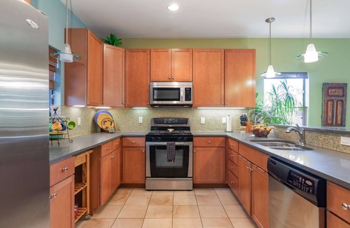 East Cesar Chavez House | Exceptional East-Side Retreat with Treehouse and Patio