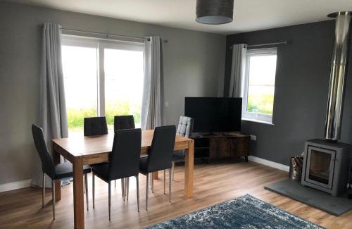 Caroy House | Discover Loch Caroy Bay Cottage: 4-Star Family Retreat
