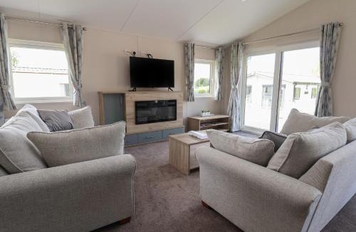 Saint Asaph House | Discover Lodge 3: Pet-Friendly Haven with Private Pool