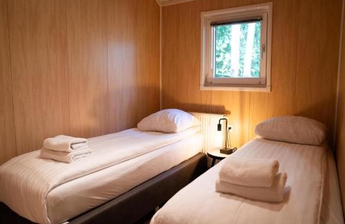 Oirschot Ski Chalet | Scenic Lodge with Terrace in Brabant's Holiday Park