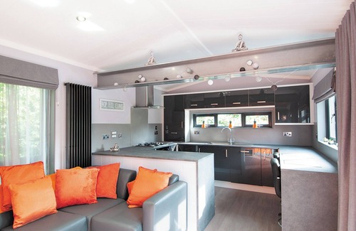 Low Newton Ski Chalet | Cozy Lodge with TV, Spa & Kitchen for Family Getaways