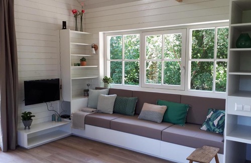 Hazerswoude-Rijndijk Cabin | Eco-Friendly Lodges by the Rhine with Pet Friendly Amenities