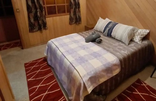 Castro Cabin | Cozy Lodging in Tehuaco with Spa Amenities for Families