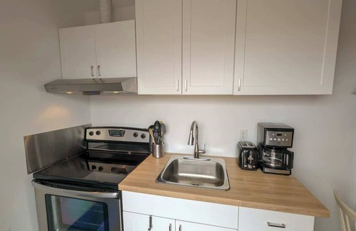 Ste Anne de Beaupre Apartment | Loft 12 | 2 Min Waterfront | BBQ & Fireplace
