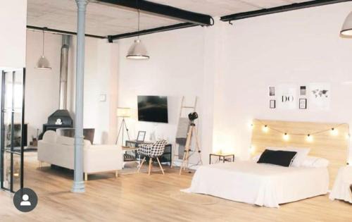 Alcala de Guadaira Apartment | Charming Loft Near Sevilla with Top Amenities & High Ratings
