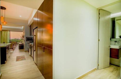 Conchas Chinas Apartment | Modern Loft Delfines with Ocean View & Inviting Pool
