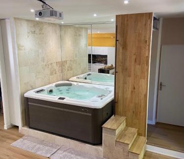 Chamalieres Apartment | Relaxing Loft "Eden" with Hot Tub & Family-Friendly Space