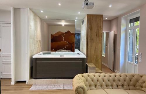 Chamalieres Apartment | Relaxing Loft "Eden" with Hot Tub & Family-Friendly Space