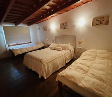 Centro Apartment | Charming Garden Loft: Child-Friendly Getaway with High Ratings