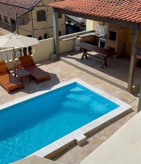 Santo Antonio do Pinhal Apartment | Discover Loft Maika'i: 4-Star Retreat with Pool & Fireplace