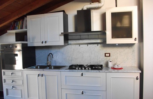 Busseto Apartment | Modern Loft with Bell Tower Views & Spa Access