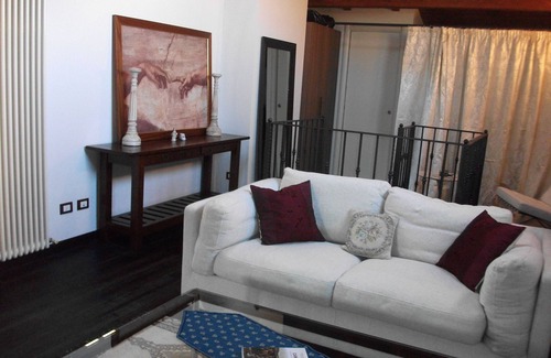 Busseto Apartment | Modern Loft with Bell Tower Views & Spa Access
