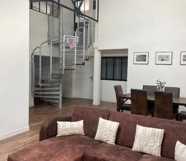 Laval Apartment | Cozy Loft Near City Center with Family-Friendly Amenities
