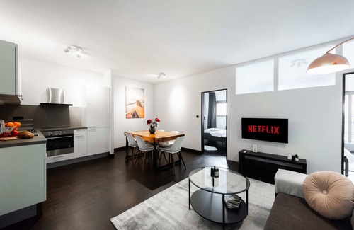Karlin Apartment | Modern 3-Bedroom Loft with Balcony and Parking Access