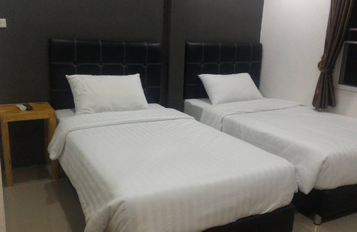 Nakhon Si Thammarat Hotel | Budget-Friendly Loftel at Nakhon with Family Amenities