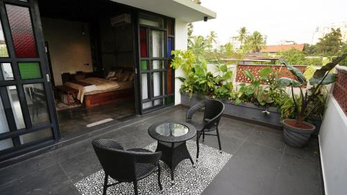 Kozhikode Apartment | Unforgettable Stay at Lofterra: Pet Friendly & Family Focused