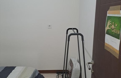 South Tangerang Apartment | Budget-Friendly Retreat at Loftvilles City with Pool Access